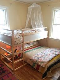 My girls both have their own rooms, which i thought they would love. We Decided On The Kura Bed From Ikea But Put A Double Bed Underneath For Reading Bedtime Stories There Isn T Kids Shared Bedroom Ikea Kura Bed Shared Bedroom