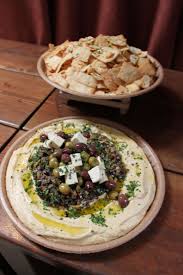 Mediterranean Meze Platter Creamy Hummus And Olive Tapenade Drizzled With Extra Virgin Olive Oil Feta Olives And Fresh Meze Platter Food Mediterranean Snacks