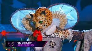 He wears a long, elaborate dress, mainly golden in color and with shining silver accents and puffy blue sleeves. Leopard Sings Big Spender By Shirley Bassey The Masked Singer Season 2 Youtube
