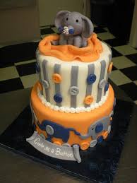 Baby Shower Cake In Grey And Perhaps I Would Pick Another Color Besides Orange Elephant Baby Shower Cake Baby Shower Cakes Shower Cakes