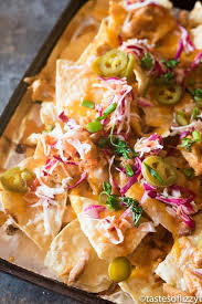 Firecracker Chicken Nachos Pack A Flavor Punch With Spicy Buffalo Sauce And Sweet Chili Sauce Slow Cook Yummy Chicken Recipes Appetizer Recipes Chicken Nachos