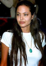 Angelina jolie from lara croft tom raider, tomb raider, young adult. Angelina Jolie Native Looking With Her Long Hair And Turquoise Necklace Angelina Jolie Hair Angelina Jolie 90s Angelina Jolie Young