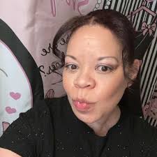 Doe Eyed Beauty Lounge added a...