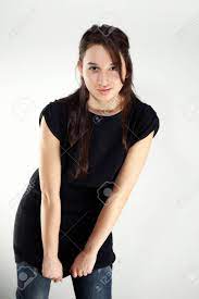 Cross-breed Euro/Asian Long Hair Brunette Girl Posing In Studio For  Portraits In Several Dress Styles. Stock Photo, Picture and Royalty Free  Image. Image 33633626.