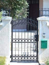 Wrought Iron Gates Securing Your Home In Style Smart Home Iron Gates Design Iron Gate Designs Photo Iron Gate Design Iron Garden Gates Simple Iron Gate Designs