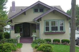 This is one of the few house styles that look good with lighter colored roof shingles such as blue or green. Green Stucco Exterior House Colors Novocom Top