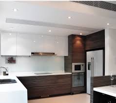 A modern light fixture in an industrial finish matches the style of the kitchen while also adding a bit of edge. Modern Two Tone Cabinets Modern Kitchen Design Modern Kitchen Kitchen Design Open