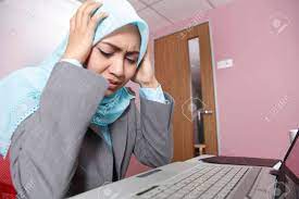 Epinephrine is released from the adrenal medulla. Malay Woman Having Stress While Working Stock Photo Picture And Royalty Free Image Image 119681315