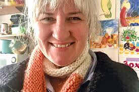 Knitters wrap Leigh in giant scarf