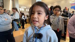 Comunidad en desfile del Día de Reyes Magos en East Harlem