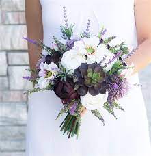 | / find purple wedding flowers, like this beautiful, faux fuchsia silk flower hanging bush in violet purple with red accents. Eggplant Succulent Mix Bouquet Lavender Sprays And Blush Tones Real Touch Flowers Silk Wedding Bouquet Wedding Flower Guide Wedding Flower Arrangements Plum Wedding