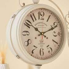 Decorative wall clocks that are perfect for the garden, patio, pool and home. Shop Kenz Double Sided Wall Clock Online Home Centre Uae