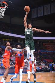 Youtu.be/cy1jn these 3 photos of jaylen brown dunking on giannis antetokounmpo are incredible. Giannis Antetokounmpo By Bill Baptist