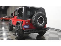 Image result for Flame Red 2006 Jeep