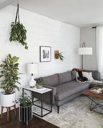 This living room uses a grey sofa, two chairs, and also a unique shape of a wooden table placed in the middle. Pin By Diego Clara On Living Room Decoration Simple Living Room Decor Apartment Small Living Room Decor Apartment Room