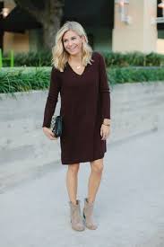 Consider Wearing A Dark Red Sweater Dress For A Casual Level Of Dress Finish Off Your Look With Beige Su Sweater Dress Women Casual Fall Outfits Sweater Dress