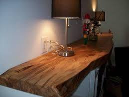 We also provide a large selection of natural and live edge mantels using various wood types: Live Edge Wood Mantel Modern Inspiration For Fireplace Mantel Wanting A Local Source Ignore The Awkward Nut Wood Mantels Wood Shelves Live Edge Furniture