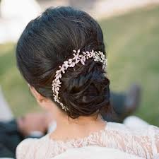 So, to avoid all that hassle, simply bun your hair in a fluffy bun. 24 Wedding Updos For Every Type Of Bride