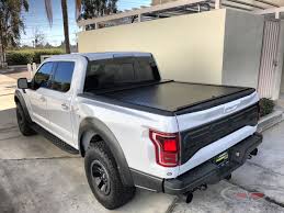There are several styles of retractable truck bed covers for same day installation. Ford Raptor 2017 With American Roll Cover Truck Covers New Trucks Ford Raptor