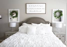 The space above the headboard is the perfect place to showcase everything from art to vintage objects and fabrics. Love The Sign Above The Bed For Our Wedding Song Lyrics Bedroom Wall Decor Above Bed Bedroom Night Stands Bedroom Wall Art Above Bed