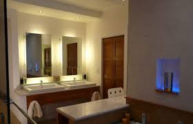 It can light up a particular piece of artwork or decorative area. Understated Radiance Dazzling Recessed Lighting For Warm And Inviting Modern Interiors Modern Bathroom Vanity Lighting Bathroom Light Fixtures Bathroom Lighting Design