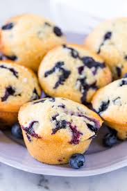 Scoop the batter into the prepared muffin cups. Easy Blueberry Muffins Recipe Fluffy And Juicy