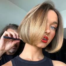 V For Hair and Beauty added a new...