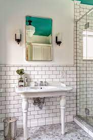 Elevate your space beyond the ordinary designs found in many common hexagon or subway tiles with the tile. Rejuvenation Echo Large Art Deco Porcelain Wall Sconce Transitional Bathroom Dave Fox Design Build Remodelers