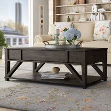 Simply apply a clear coat, stain or paint your favorite color. August Grove Clark Fork Solid Wood Lift Top Coffee Table With Storage Reviews Wayfair