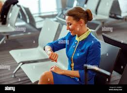 Woman at work at airport hi-res stock photography and images - Alamy