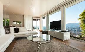 It uses straightforward furniture and dramatic modern art to complement the stark architecture. Beautiful Interiors Of A Modern House Living Room Stock Photo Picture And Royalty Free Image Image 31912255