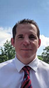 Erwin hires new basketball coach