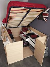 Space Saving Bed Unit For Small Bedrooms Opens Up To Reveal Wardrobe Area Designtaxi Com Tiny House Storage Small Spaces Bedroom Design