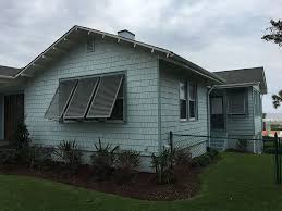 Bahama shutters are stylish a type of shutters that are known for their hurricane protection; Bahama Shutters Tampa Bay Florida Master Aluminum