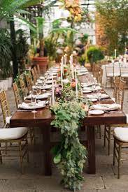 Farm Tables With Green Garland Table Runner Botanical Gardens Wedding Garden Wedding Wedding Centerpieces