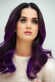 The singer has dyed her hair from slime green to muppet red, and now she's returned to a hue she's very comfortable with — purple! For My Mother This With A Little Less Purple Could Maybe Be Acceptable Hair Color Purple Dark Purple Hair Katy Perry Purple Hair