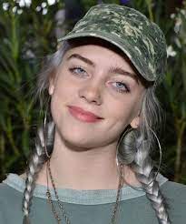 Billie eilish has everyone shook debuting her bleach blonde hair and revealing her trademark green and black hairdo was in fact a wig for around two billie, 19, posted a rare tiktok, filming herself singing before reaching for the front of her hair and lifting it up, much to the shock of every single. Billie Eilish Hair Evolution Of Her Best Colors Looks