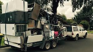 driver tows trailer carrying everything