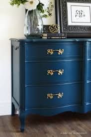 Bedroom set aficionados will be tickled by the glut of both french provincial low boy dressers and chest of drawers, or, french provincial high boys that exist on the market. Sold Out Navy Blue Dresser Gold Hardware Vintage Etsy French Provincial Dresser Furniture Makeover Vintage Bedroom Furniture