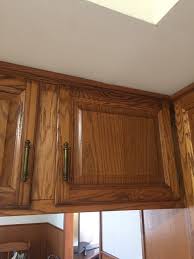 staining honey oak cabinets cherry with