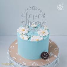 This classic floral wedding cake is filled with vanilla sponge, vanilla cream and mixed fruit jam for the sweet . Mini Cake Pastel Blue White Floral Art 1 Ib Basketeer The Ultimate Gifts
