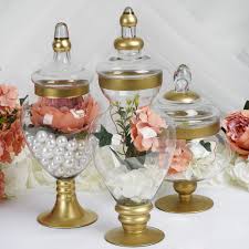 An apothecary jar may remind you of potions class, as it is the ideal container for the ingredients of that liquid luck you need for snape's class. Set Of 3 Gold Trimmed Glass Apothecary Candy Jars With Lids 10 14 16 Tableclothsfactory