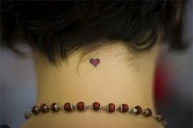 Tiny Heart Tattoo Nestled Below The Hairline On The Back Of The Neck Red Heart Tattoos Small Heart Tattoos Tiny Heart Tattoos
