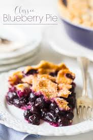 Very berry pie in small bowl, stir together cream cheese, confectioners sugar and 1 teaspoon water. Classic Blueberry Pie Flaky Crust Thick Glaze Y Filling Baking A Moment