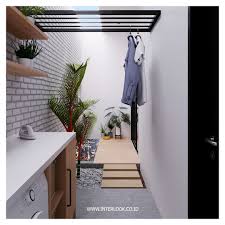 Rekomendasi pertama yang bisa anda gunakan untuk desain ruang jemuran baju minimalis di dalam rumah kali ini nampak fungsional. Desain Tempat Jemuran Apartemen Cek Bahan Bangunan