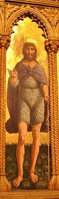 He is found in the desert, he is to endure the scorching hot weather; St John The Baptist Art Iconography Legend