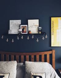 A Strong Statement Blue From Dulux Breton Blue And A Pop Of Yellow From The Manchester Print Perfect Blue Bedroom Walls Blue Bedroom Paint Blue Living Room