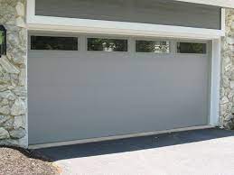 (since 1979) joined together to add fireplace and insulation services to the company's garage door business. Flush Panel Garage Door With Windows In Grey Garage Doors Garage Door Panels Garage Door Windows