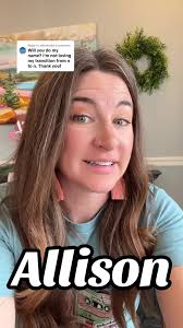 Mom with Brown Curly Hair and Tattoos Named Allison Bee