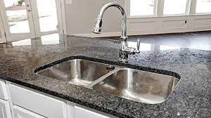 Steel gray granite with white cabinets. White Kitchen Cabinets With Granite Countertops Designing Idea